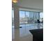 Spacious living room featuring city views through expansive windows at 150 E Robinson St # 2002, Orlando, FL 32801