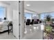 Living room with white tile flooring, windows with views and seating at 150 E Robinson St # 2002, Orlando, FL 32801