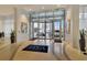 Modern lobby with terrazzo floors, revolving doors, artwork, and ample natural light at 150 E Robinson St # 2002, Orlando, FL 32801