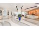 Bright, modern lobby with sleek design, reception desk, and comfortable seating areas for a grand entry at 150 E Robinson St # 2002, Orlando, FL 32801