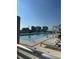 Stunning rooftop pool with lounge chairs, offering a luxurious and relaxing amenity at 150 E Robinson St # 2002, Orlando, FL 32801