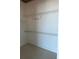 Spacious walk-in closet with multiple shelves and hooks for optimal storage solutions at 150 E Robinson St # 2002, Orlando, FL 32801