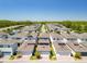 Aerial view of a residential neighborhood showcasing similar styled homes at 15959 Pantuso Aly, Winter Garden, FL 34787