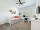 Comfortable bedroom featuring a daybed, desk, and bright natural light at 15959 Pantuso Aly, Winter Garden, FL 34787