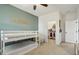 Cozy bedroom features a bunk bed, closet, and room for storage at 17226 Hickory Wind Dr, Clermont, FL 34711