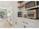 Kitchen includes stainless steel appliances and subway tile backsplash at 17226 Hickory Wind Dr, Clermont, FL 34711