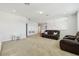 Upstairs living area with lots of open space and natural light at 17226 Hickory Wind Dr, Clermont, FL 34711
