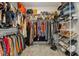 Spacious walk-in closet with ample storage and built-in shelving at 17226 Hickory Wind Dr, Clermont, FL 34711