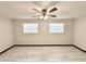 This bedroom offers light grey wood-look floors and a ceiling fan at 2007 N Hastings St, Orlando, FL 32808