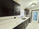 Stylish kitchen with white marble countertops and stainless steel appliances at 2007 N Hastings St, Orlando, FL 32808