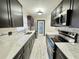 Modern kitchen featuring stainless steel appliances and elegant countertops at 2007 N Hastings St, Orlando, FL 32808