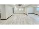 Bright and airy living room with updated flooring and recessed lighting at 2007 N Hastings St, Orlando, FL 32808
