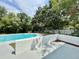 The pool area features a patio, landscaping, and a fenced yard at 2007 N Hastings St, Orlando, FL 32808