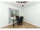 Cozy bedroom with a black desk and chair near a window offering natural light at 205 Sanora Blvd, Sanford, FL 32773
