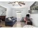 This flex-space provides comfortable seating and an adjacent desk and storage space at 2117 Stone Abbey Blvd, Orlando, FL 32828