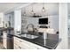 Eat-in kitchen offers granite countertops, stainless steel appliances, and a view into the living space at 2117 Stone Abbey Blvd, Orlando, FL 32828