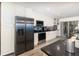Well-equipped kitchen with stainless steel appliances, sleek countertops, and ample cabinet space at 2117 Stone Abbey Blvd, Orlando, FL 32828