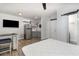Cozy studio apartment with a kitchenette, modern appliances, and stylish flooring at 2117 Stone Abbey Blvd, Orlando, FL 32828