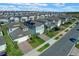 An aerial shot reveals a neighborhood with neatly arranged houses and driveways at 2304 Mystic Maze Ln, Clermont, FL 34715