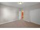 Bedroom with carpeted floor and closet near the door to the en-suite bathroom at 2304 Mystic Maze Ln, Clermont, FL 34715