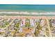 Aerial view showcasing the condo's proximity to the ocean, community pool, and surrounding neighborhood at 2750 Ocean Shore Blvd # 350, Ormond Beach, FL 32176