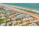 Aerial view of the community and beach, emphasizing the prime oceanfront location at 2750 Ocean Shore Blvd # 350, Ormond Beach, FL 32176