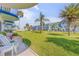Enjoy this view of the community and lush greenery from your private back patio seating area at 2750 Ocean Shore Blvd # 350, Ormond Beach, FL 32176