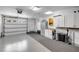 Well-lit garage featuring ample storage space, cabinets, and organization racks at 2750 Ocean Shore Blvd # 350, Ormond Beach, FL 32176