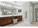 Spacious bathroom with a double vanity, linen closet, and separate toilet room at 2842 Balforn Tower, Winter Garden, FL 34787