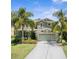 Charming two-story home with a well-manicured lawn and a spacious two car garage at 2842 Balforn Tower, Winter Garden, FL 34787