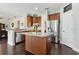 Charming kitchen with stainless steel appliances and center island at 2842 Balforn Tower, Winter Garden, FL 34787