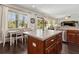 Open kitchen design with stainless steel appliances and island at 2842 Balforn Tower, Winter Garden, FL 34787