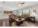 Inviting living room with hardwood floors, neutral paint, and elegant furnishings at 2842 Balforn Tower, Winter Garden, FL 34787