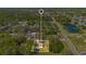 A charming home location surrounded by mature trees, conveniently located near a serene pond at 2927 Ahern Dr, Orlando, FL 32817