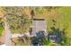 A charming property featuring a well-maintained roof, long drive and lush landscaping at 2927 Ahern Dr, Orlando, FL 32817
