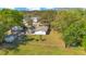 Spacious backyard with mature trees and a storage shed perfect for gardening and outdoor entertaining at 2927 Ahern Dr, Orlando, FL 32817