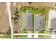 Aerial view showing two houses with manicured lawns and brick paver driveways at 3017 Ambersweet Pl, Clermont, FL 34711