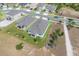 Aerial view of neighborhood featuring homes with manicured lawns and mature trees at 3017 Ambersweet Pl, Clermont, FL 34711