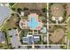 Overhead view of community amenities, including a pool, playground, clubhouse, and sports field at 3017 Ambersweet Pl, Clermont, FL 34711
