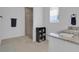 Bathroom featuring a glass shower enclosure and a vanity with a granite countertop at 3017 Ambersweet Pl, Clermont, FL 34711