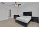 Bedroom featuring a ceiling fan, carpeted floor and an en-suite bathroom at 3017 Ambersweet Pl, Clermont, FL 34711