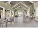 Bright clubhouse featuring a spacious common area with comfortable seating and high ceilings at 3017 Ambersweet Pl, Clermont, FL 34711