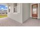 Welcoming front porch with brick pavers, white shutters, and a red front door at 3017 Ambersweet Pl, Clermont, FL 34711