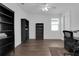 Office space with hardwood floors and a ceiling fan at 3017 Ambersweet Pl, Clermont, FL 34711