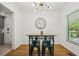 Breakfast nook with a modern chandelier and tree art piece at 318 E Jersey St, Orlando, FL 32806