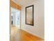 Hallway view into kitchen boasts lots of light and plenty of storage at 318 E Jersey St, Orlando, FL 32806