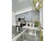 Stylish kitchen with stainless steel appliances, gray cabinets, and modern gold hardware at 318 E Jersey St, Orlando, FL 32806