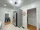 Bright kitchen featuring gray cabinets, stainless steel appliances, and modern lighting at 318 E Jersey St, Orlando, FL 32806