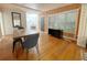 Spacious living room boasts hardwood floors, modern furniture, and natural light at 318 E Jersey St, Orlando, FL 32806