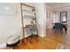 Modern home office featuring a leaning desk, rolling chair, and stylish decor at 318 E Jersey St, Orlando, FL 32806